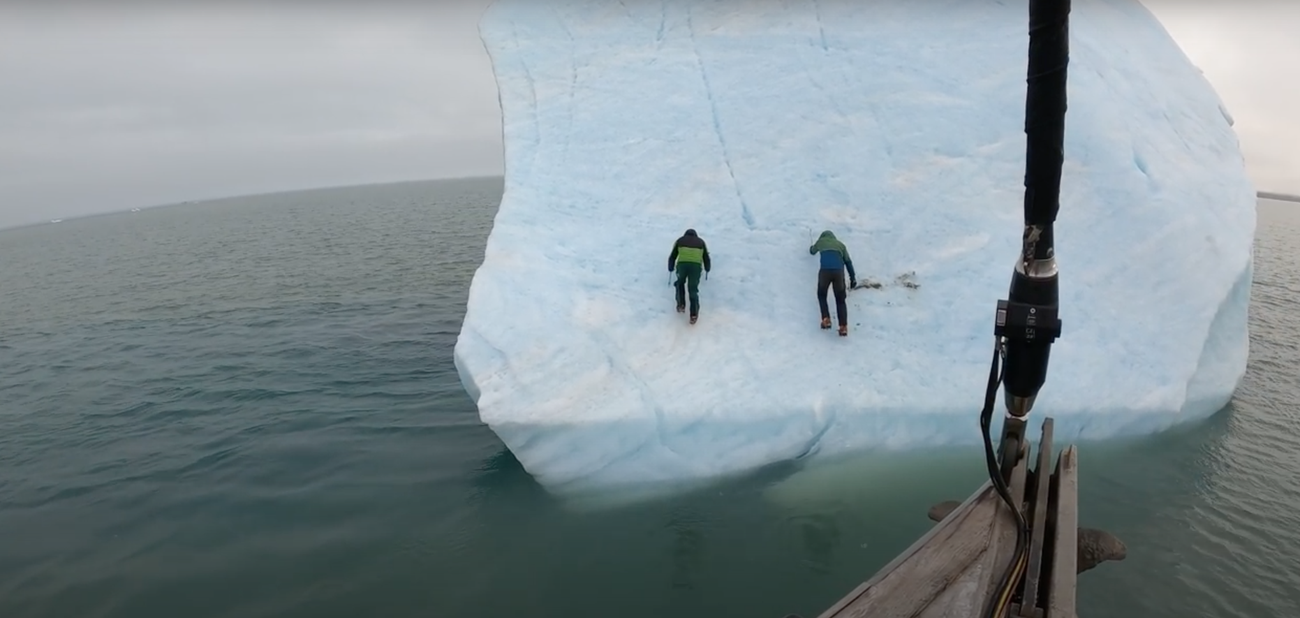 Iceberg Nearly Crushes Climbers When it Suddenly Flips - Trill Mag