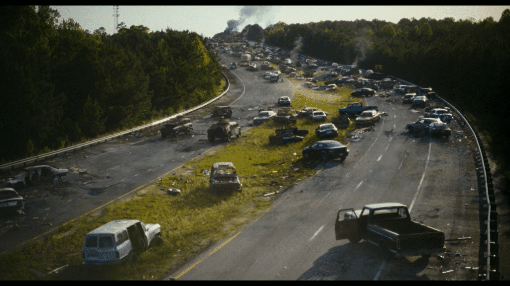 The main characters start on their way to Washington DC on a cluttered highway of destroyed cars.