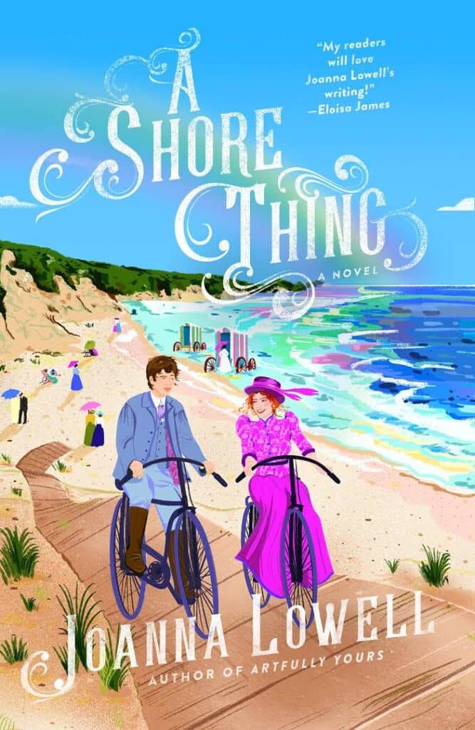 Image of book cover. Cartoon illustration of vibrant beach scene with blue skies, a rainbow, and sand. The title 'A Shore Thing' is at the top of the cover in large white wispy writing. Below are two cartoon figures on bikes. The man on the left has short brown hair and is wearing a light blue three piece suit, a purple tie, and knee high brown boots. Next to him on the right is a smiling woman with a pink hat and curly red hair, she smiling and wearing a pink victorian dress. Beneath them in the same wispy white writing is the authors name, "Joanna Lowell" and in smaller white writing below that are the words "Author of Artfully Yours"