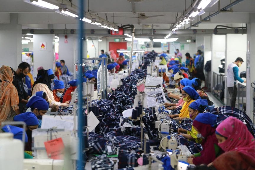 Bangladeshi people working at a garment factory.