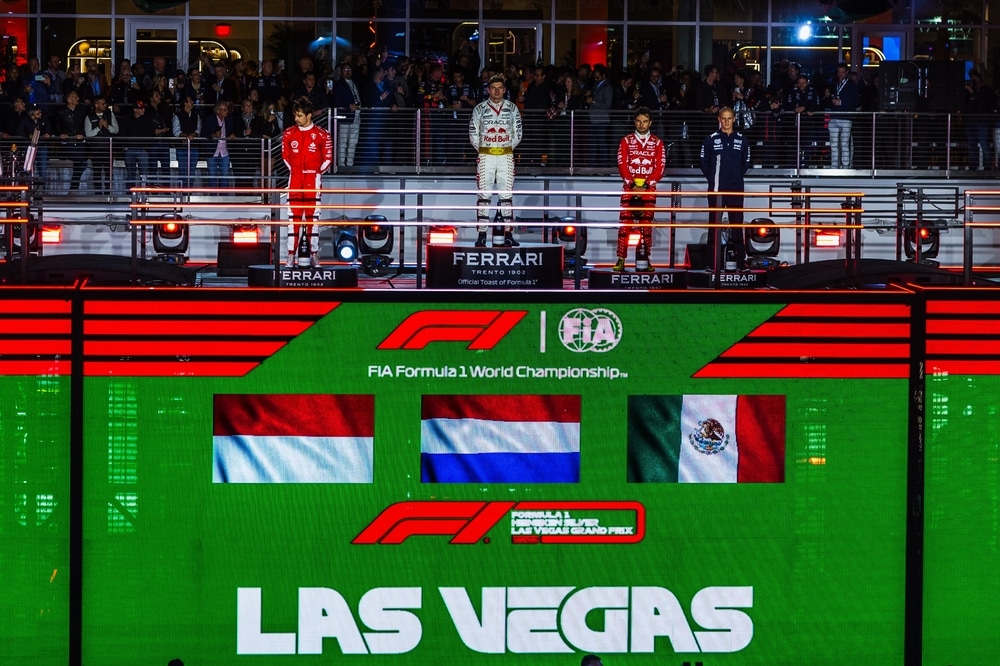 Max Verstappen, Charles Leclerc, and Sergio Perez on the podium