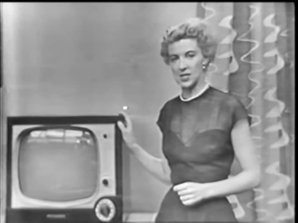 Display woman (uncredited) advertising an old television.