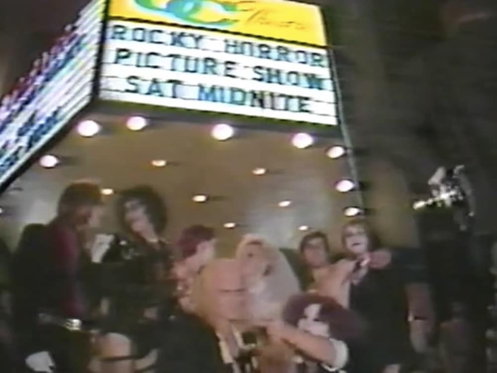 Fans of "The Rocky Horror Picture Show" stand outside of a movie theater in 1985.